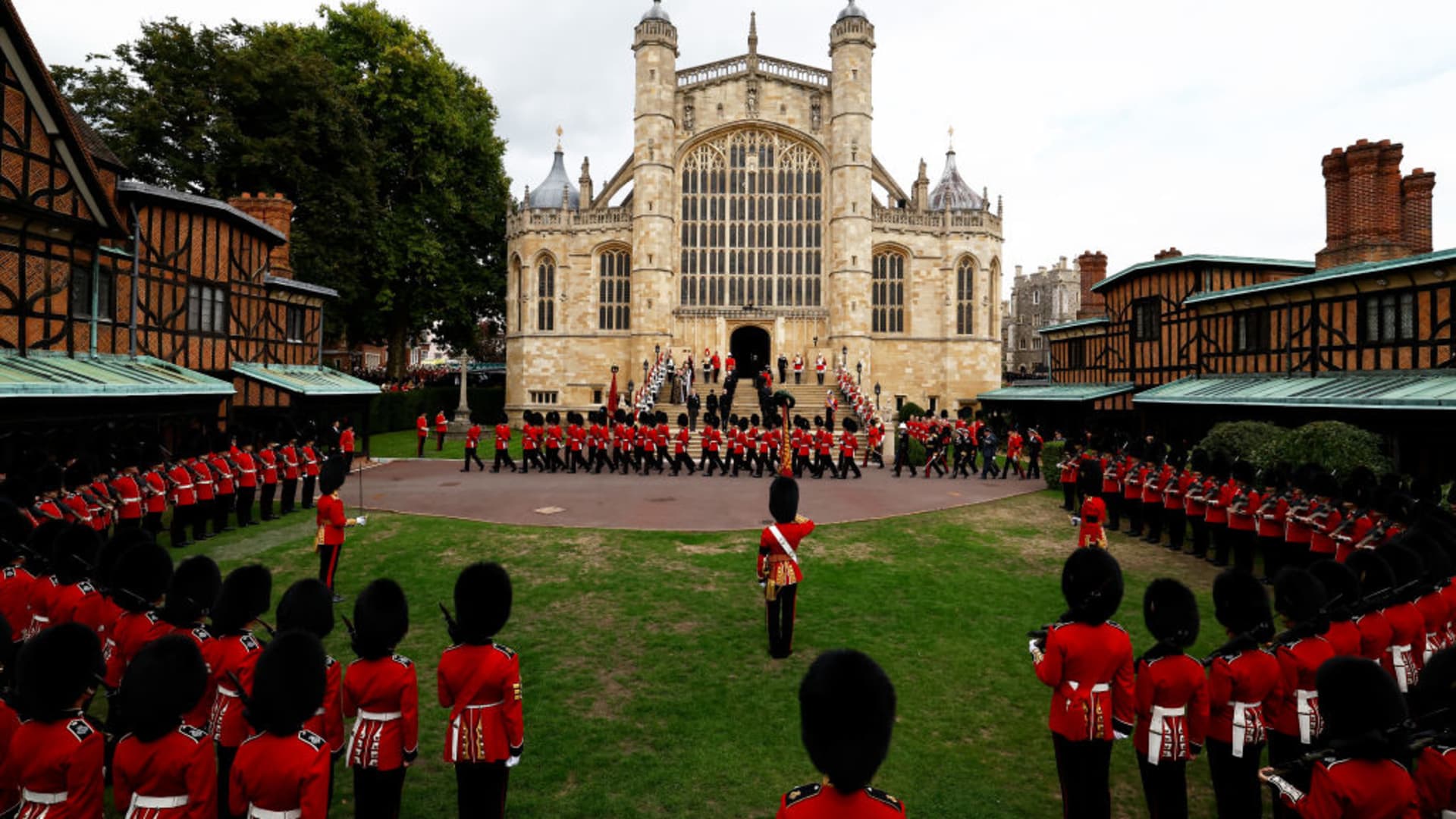 A general view of the Grenadier Guards as the State Hearse carrying Queen Elizabeth II arrives at St. George's Chapel on September 19, 2022 in Windsor, England.