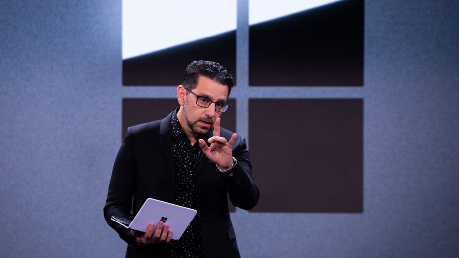 Panos Panay, chief product officer of Microsoft, holds the Surface Neo laptop computer during a Microsoft product event in New York on Oct. 2, 2019.