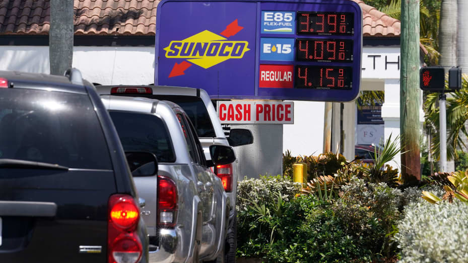 Cars line up at a Sunoco gas station offering high-level ethanol-gasoline blends at a cost below regular gasoline, Wednesday, April 13, 2022, in Delray Beach, Fla.