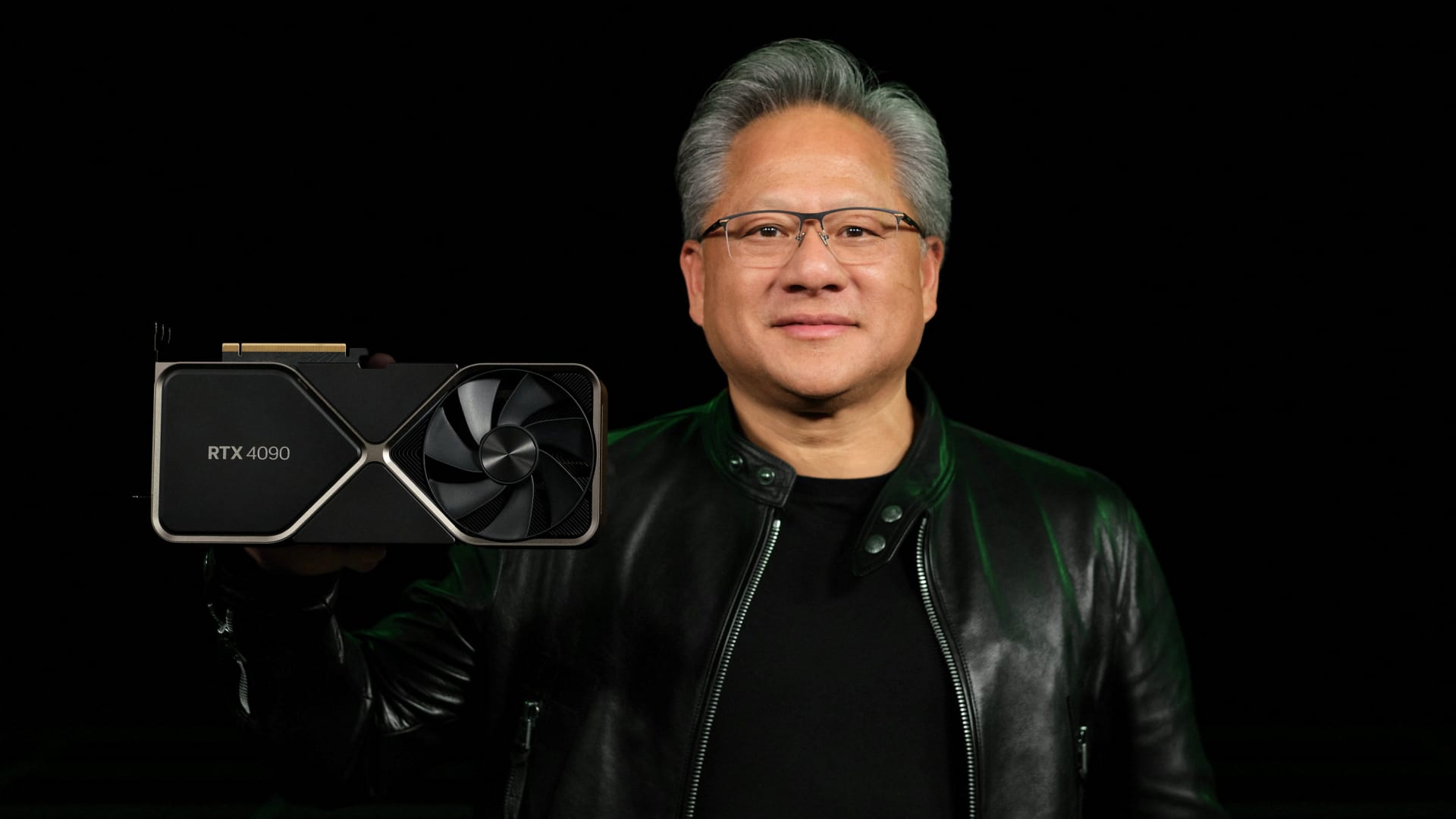 Nvidia Corp CEO Jensen Huang holds one of the company's new RTX 4090 chips for computer gaming in this undated handout photo provided September 20, 2022.