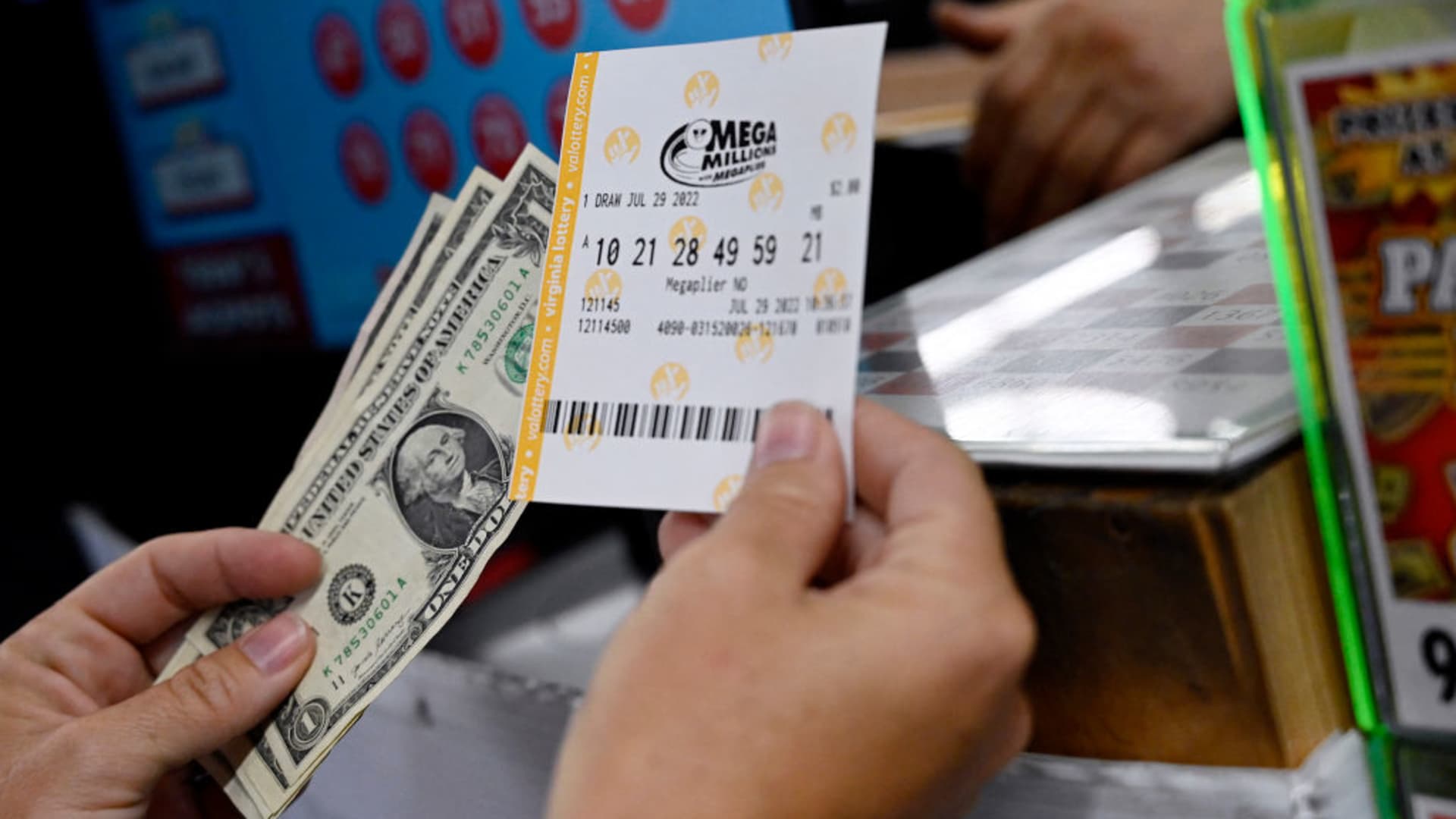 2 people will split the $1.3 billion Mega Millions jackpot—here’s how much they’..
