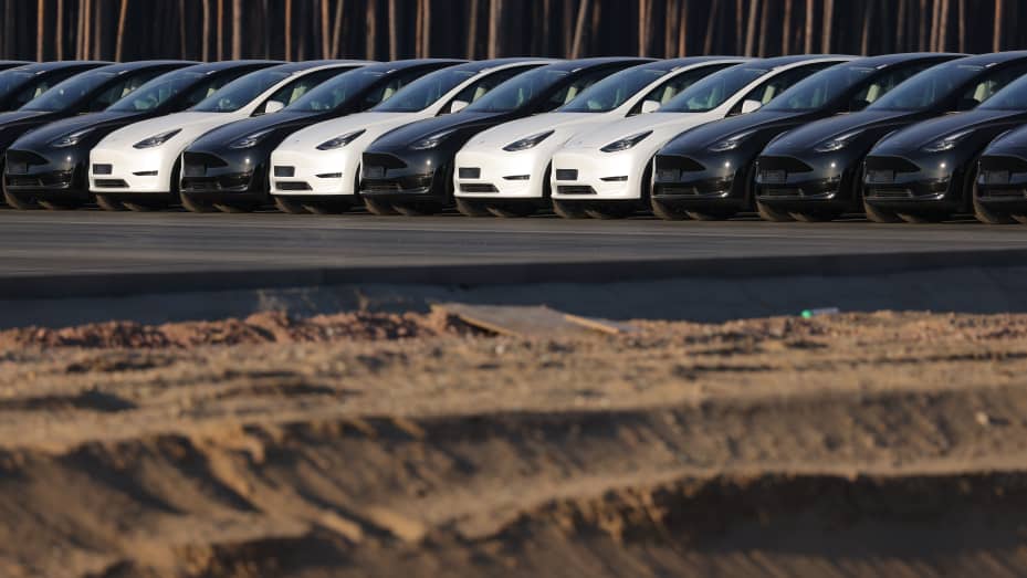 GRUENHEIDE, GERMANY - MARCH 21: Newly completed Tesla Model Y electric cars stand at the new Tesla Gigafactory electric car manufacturing plant on March 21, 2022 near Gruenheide, Germany. The new plant, officially called the Gigafactory Berlin-Brandenburg, will officially open tomorrow with an event with German Chancellor Olaf Scholz and Tesla CEO Elon Musk. The new plant is producing the Model Y as well as electric car batteries. (Photo by Sean Gallup/Getty Images)