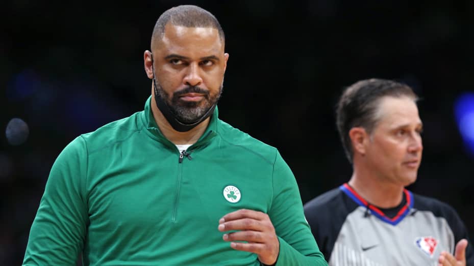 Celtics head coach Ime Udoka (left) did not agree with a referee (right) in the second quarter during a game between the Boston Celtics and the Golden State Warriors, Game Six of the NBA Finals at the TD Garden in Boston on June 17, 2022.