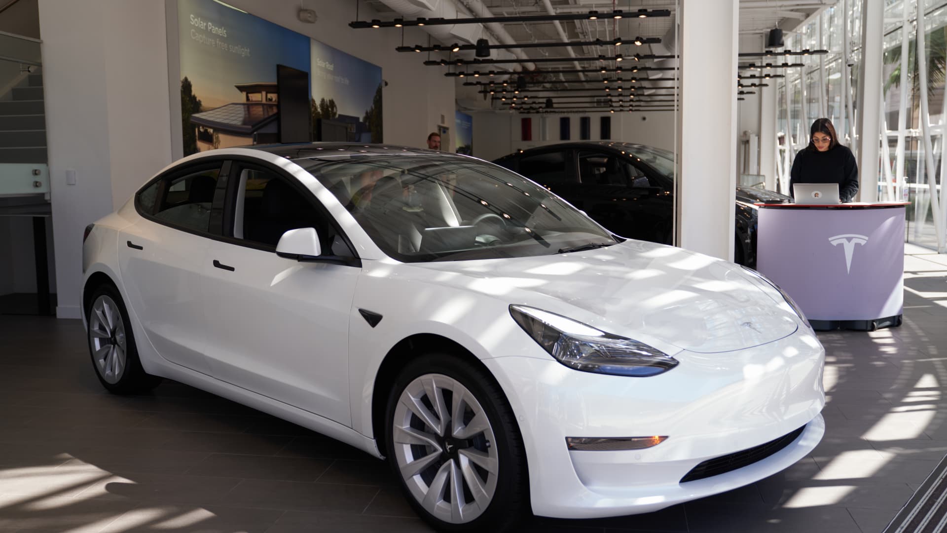 A Tesla Model 3 vehicle is on display at the Tesla auto store on September 22, 2022 in Santa Monica, California. Tesla is recalling over 1 million vehicles in the U.S. because the windows can pinch a person's fingers while being rolled up.