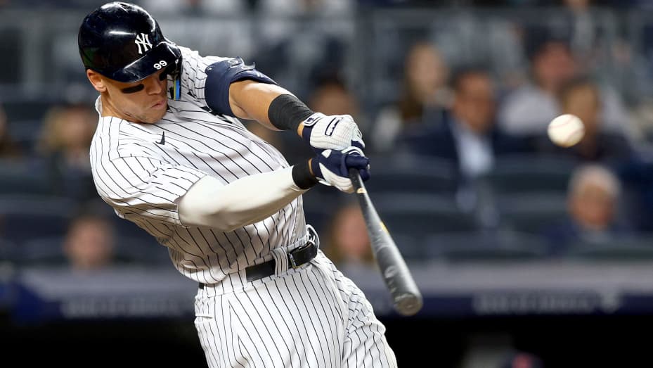Aaron Judge #99 of the New York Yankees hits a solo home run in the fifth inning against the Cleveland Guardians at Yankee Stadium on April 22, 2022 in the Bronx borough of New York City.