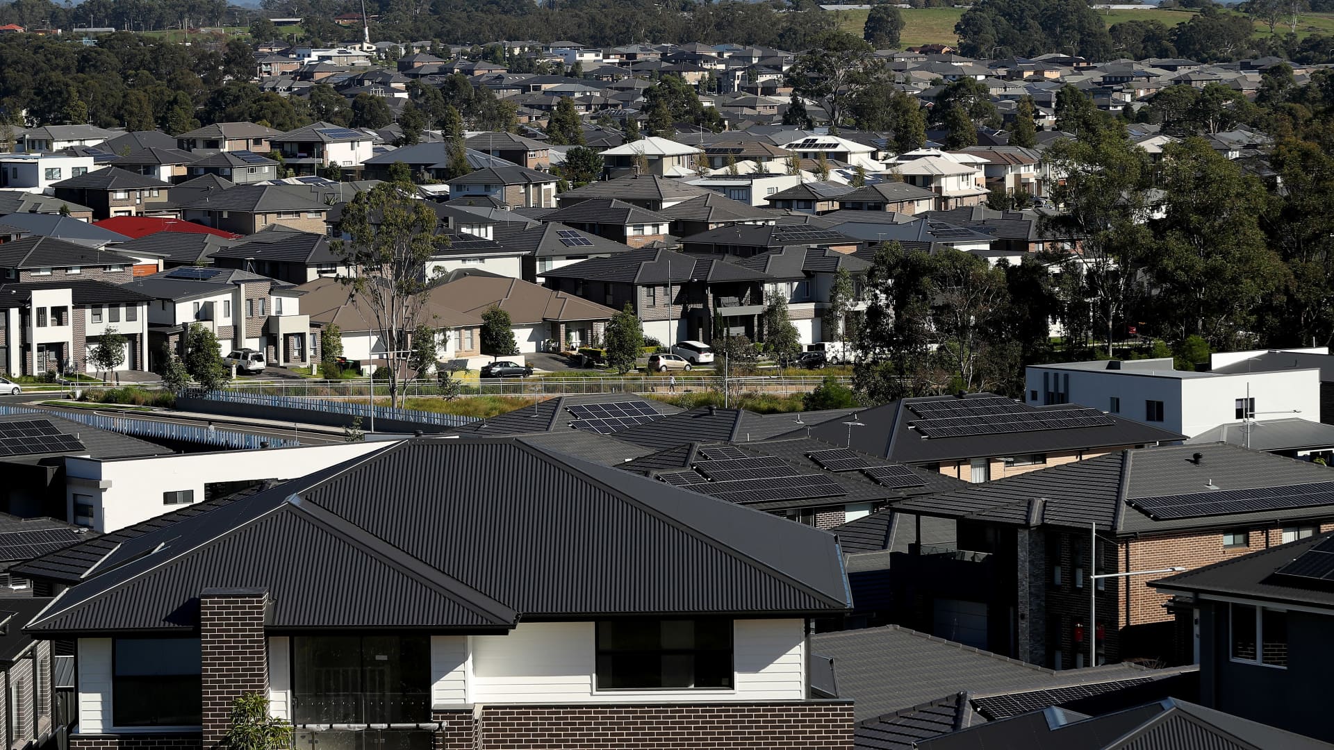 Australia’s house prices fall, interest rates soar but analysts say there’s no crash yet
