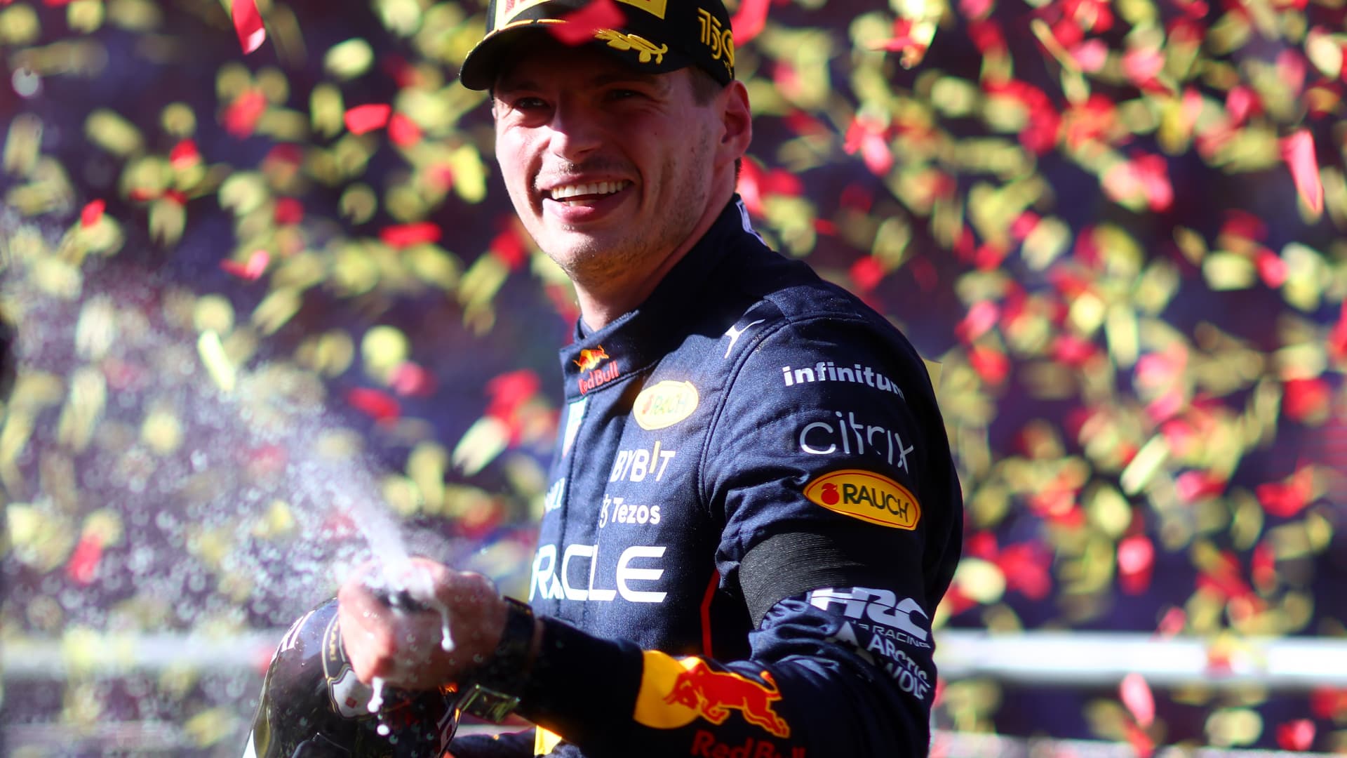 Max Verstappen of the Netherlands and Oracle Red Bull Racing celebrates his win on the podium after the Italian Grand Prix on Sept. 11, 2022 in Monza, Italy.