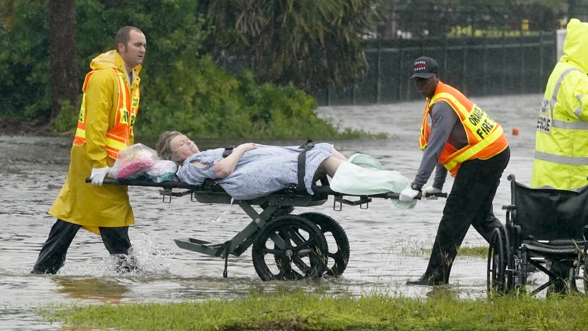 Authorities transport a person out of the Avante nursing home in the aftermath of Hurricane Ian, Thursday, Sept. 29, 2022, in Orlando, Fla.