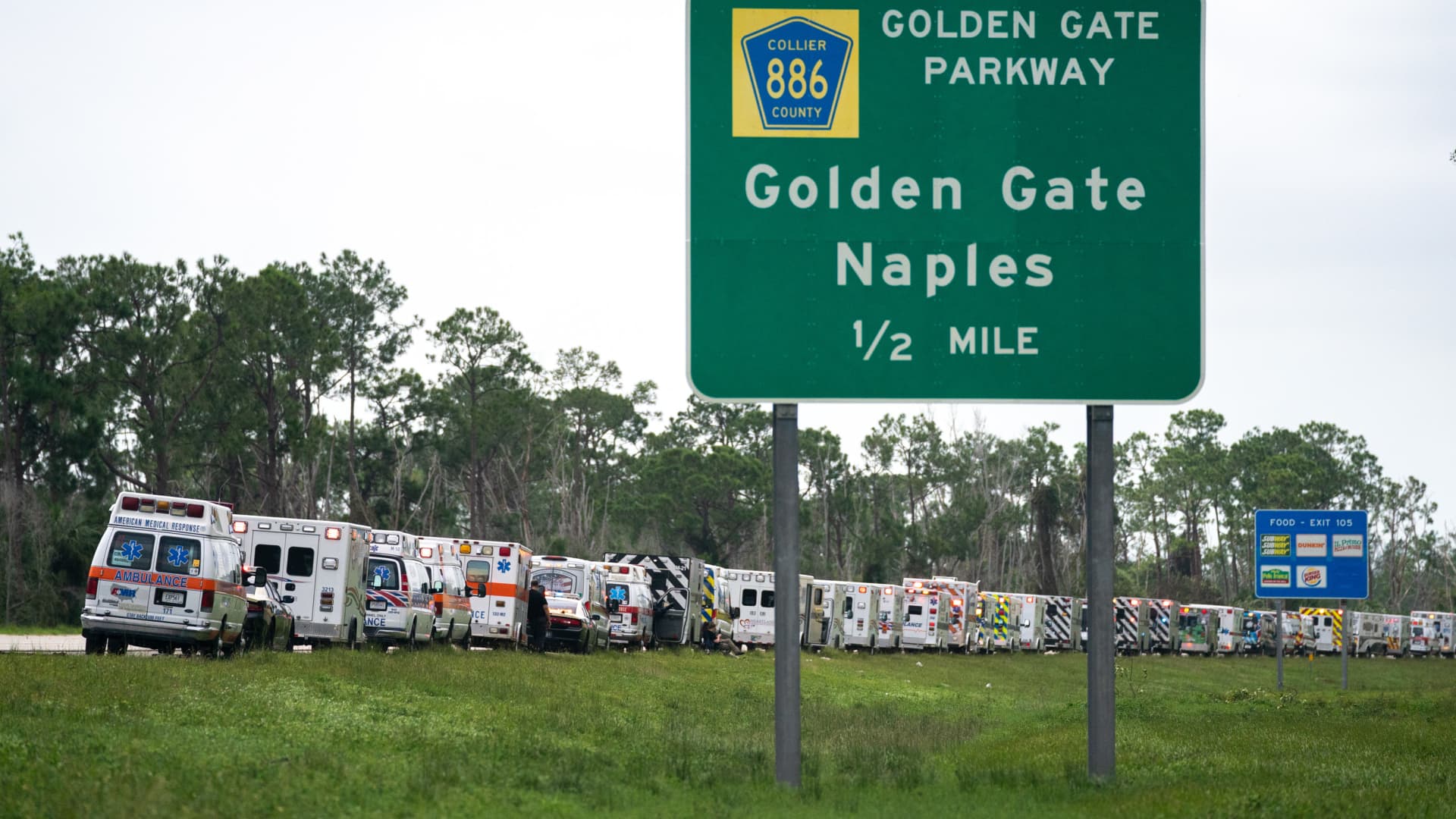 NAPLES, FL - SEPTEMBER 29: Ambulances line up on the shoulder after Hurricane Ian on September 29, 2022 in Naples, Florida. Hurricane Ian brought high winds, storm surge and rain to the area causing severe damage.(Photo by Sean Rayford/Getty Images)