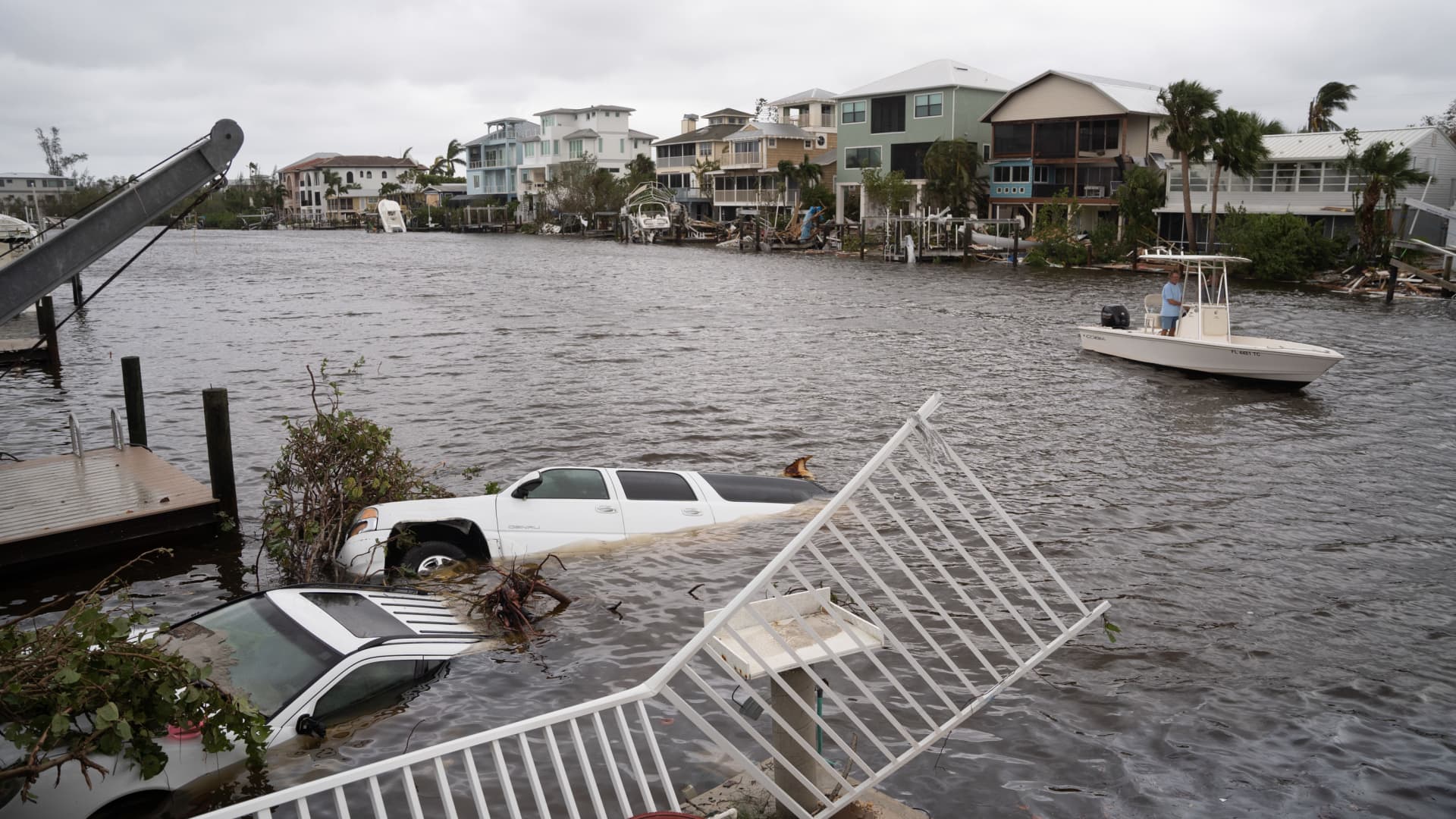 Vehicles float in the water after Hurricane Ian on September 29, 2022 in Bonita Springs, Florida. Hurricane Ian brought high winds, storm surge and rain to the area causing severe damage.