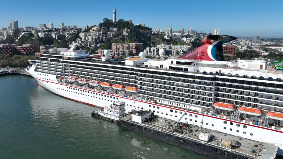 SAN FRANCISCO, CALIFORNIA - SEPTEMBER 30: In an aerial view, the Carnival Miracle cruise ship operated by Carnival Cruise Lines sits docked at Pier 27 on September 30, 2022 in San Francisco, California. Carnival reported third-quarter earnings that fell short of analyst expectations with revenues of $4.31 billion, up from $546 million one year ago but under the estimate of $4.90 billion. Shares of Carnival fell 20 percent when the company predicted a loss in the next quarter. (Photo by Justin Sullivan/Getty