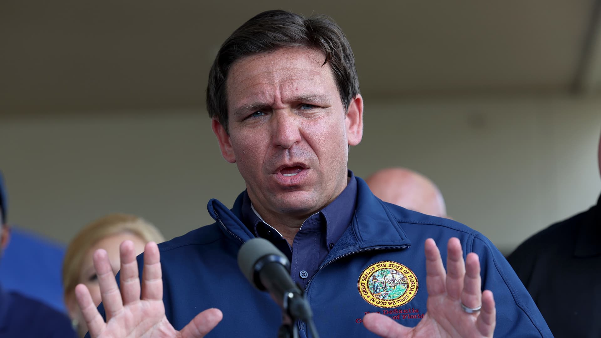 Florida Governor Ron DeSantis speaks during a press conference to update information about the on ongoing efforts to help people after hurricane Ian passed through the area on October 4, 2022 in Cape Coral, Florida.
