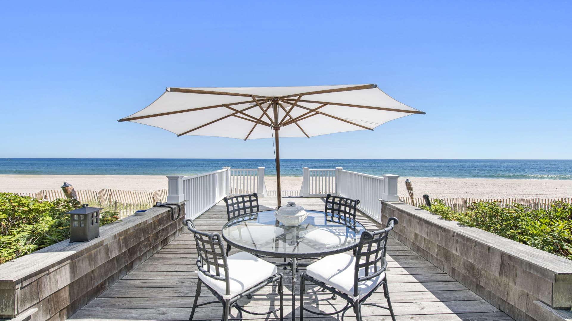 Deck and stairway leading to a 400-foot stretch of sand on Southampton's exclusive beachfront.