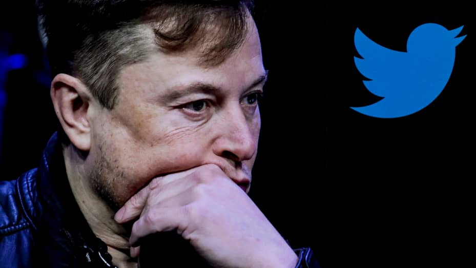 In this photo illustration, the image of Elon Musk is displayed on a computer screen and the logo of twitter on a mobile phone in Ankara, Turkiye on October 06, 2022.