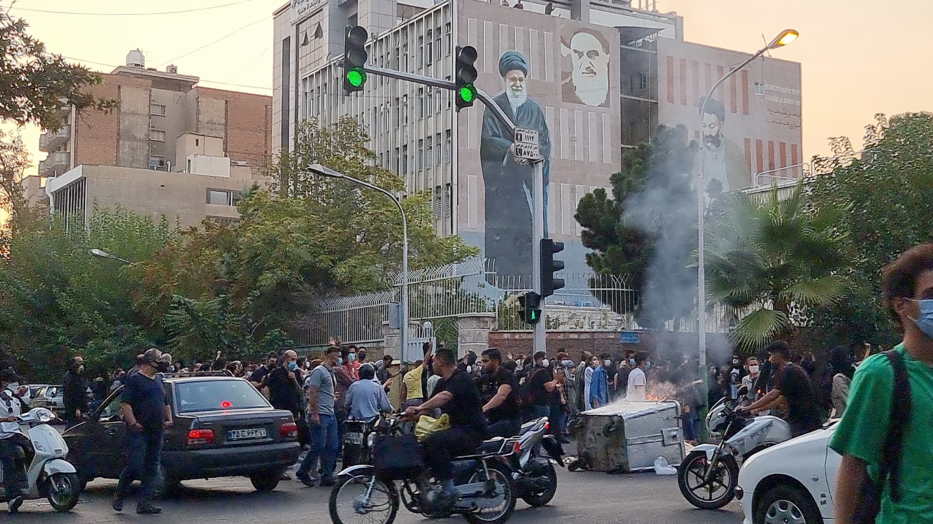 People gather in protest against the death of Mahsa Amini along the streets on September 19, 2022 in Tehran, Iran. Anti-government uprisings are to remain a sticking point and increase in frequency in Iran's political landscape as dissatisfaction with other factors like the country's economic conditions surface, according to analysts.