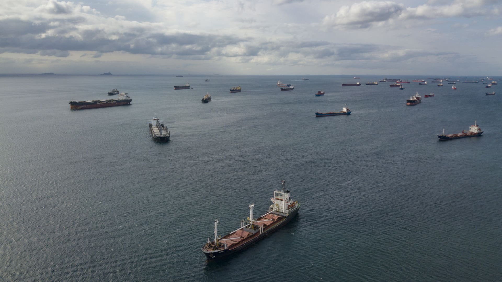 An aerial view shows ships at the anchorage area of the Bosphorus southern entrance in Istanbul, on October 12, 2022.