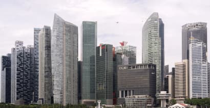 Singapore's economy grew in the third quarter, central bank tightens policy