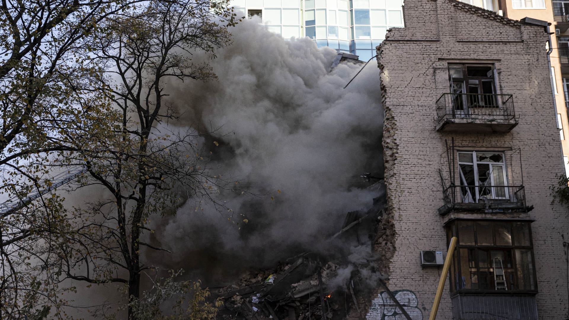 Smoke rises from a destroyed building after Russian attacks in Kyiv, Ukraine on October 17, 2022. It was reported that at least four explosions were heard in Ukraineâs capital Kyiv on Monday as authorities reported attacks by Russian kamikaze drones.