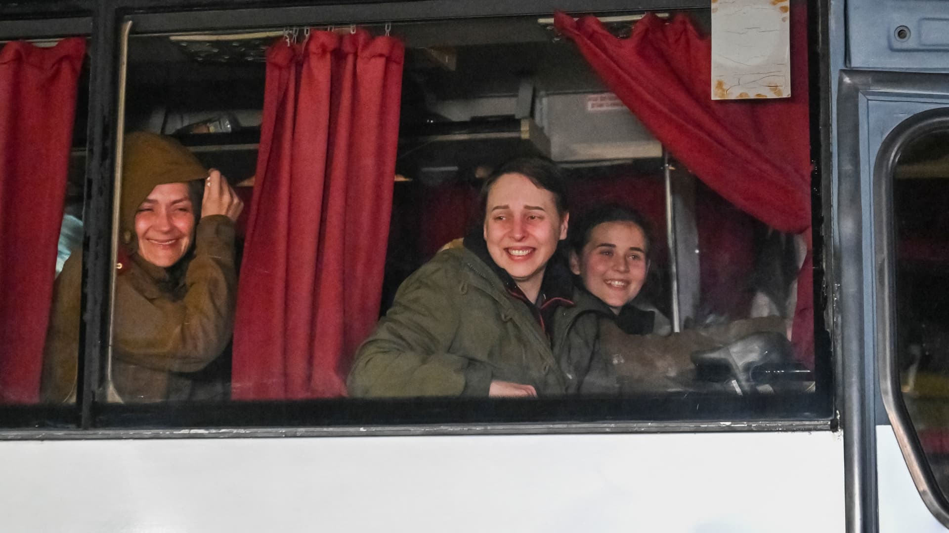 Ukrainian prisoners of war (POWs) look out of a bus window, amid Russia's attack on Ukraine, as they arrive in Zaporizhzhia, Ukraine October 17, 2022.