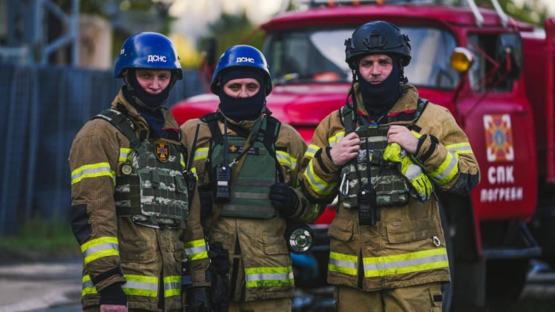 Members of emergency services respond to a fire after a Russian attack targeted energy infrastructure in Kyiv, Ukraine, on Oct. 18, 2022.