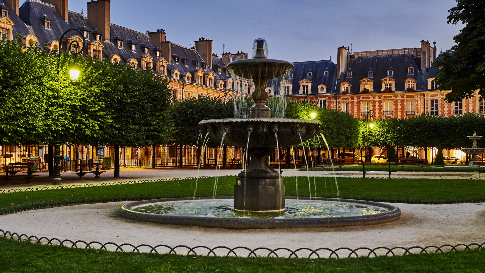 The Place Des Vosges, a square in the Marais district of Paris. Guests taking part in Stay Awhile's French baking course visit the area to sample gourmet delicacies.