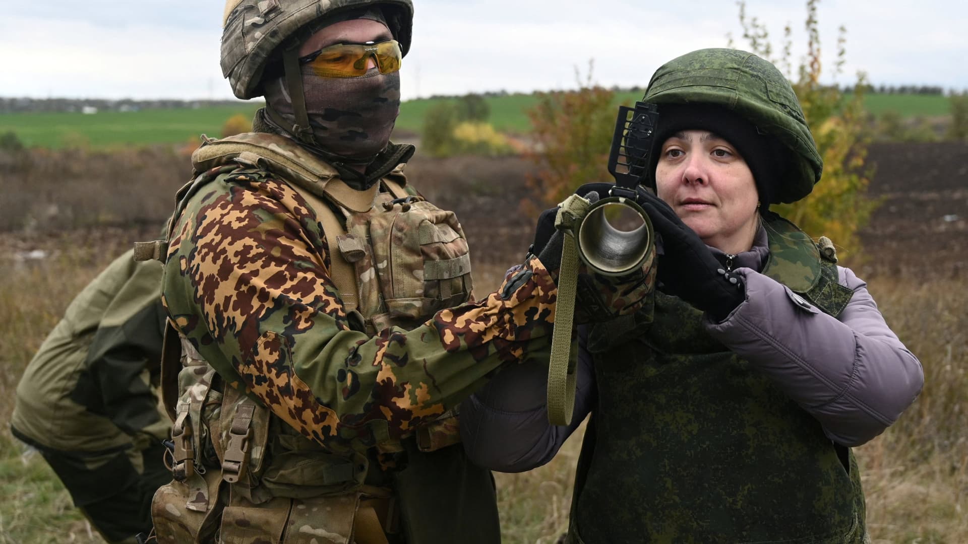 A woman receives instructions during a combat training session for civilians organised by local authorities at a range in Rostov Region, Russia October 21, 2022.