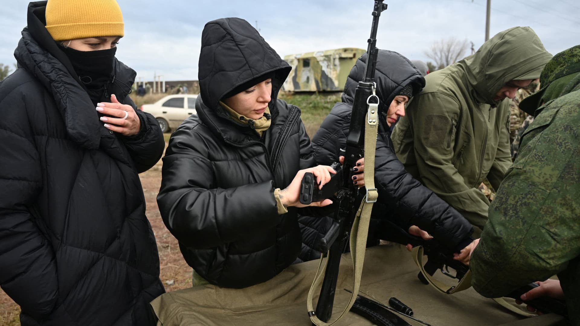 Participants assemble rifles during a combat training session for civilians organised by local authorities at a range in Rostov Region, Russia October 21, 2022.
