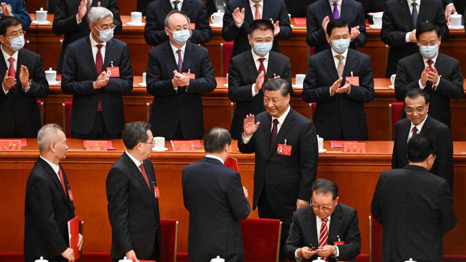 China's President Xi Jinping (C) gestures during the closing ceremony of the 20th Chinese Communist Party's Congress at the Great Hall of the People in Beijing on Oct. 22, 2022.