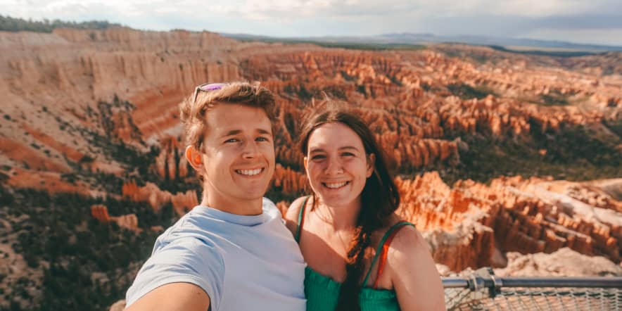 A couple ditched the corporate life to drive around the world. Here's how they're paying for it