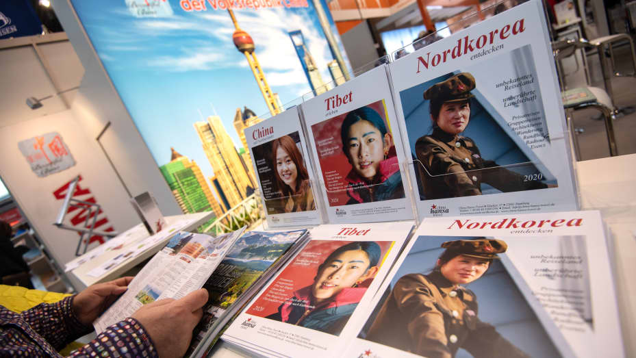 Travel brochures promoting North Korea, Tibet and China at a stand at the CMT travel trade fair in January 2020.