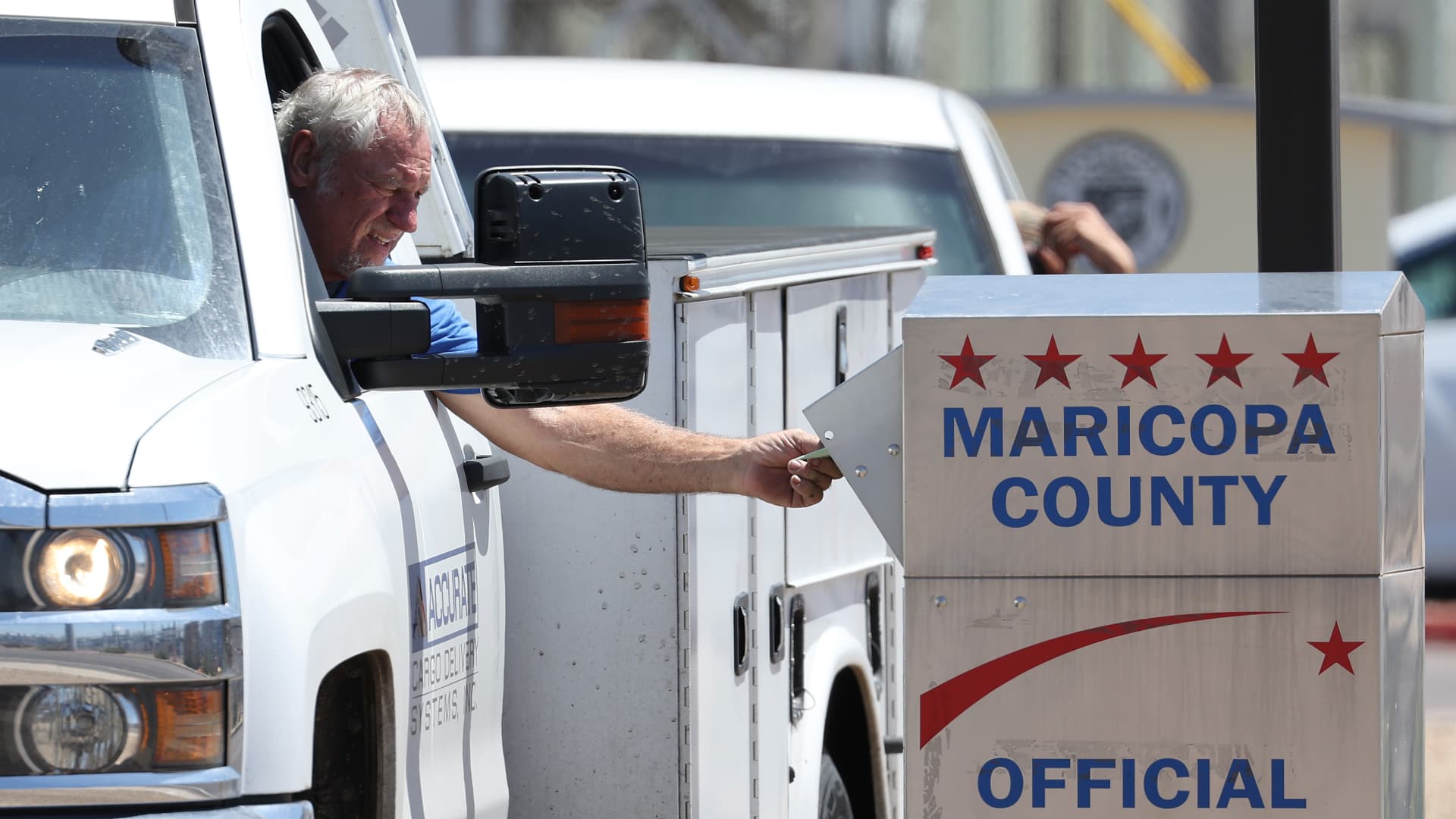 Election officials facing armed militia presence at some polls