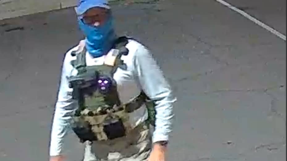 Two armed individuals dressed in tactical gear were onsite the Mesa ballot drop box.