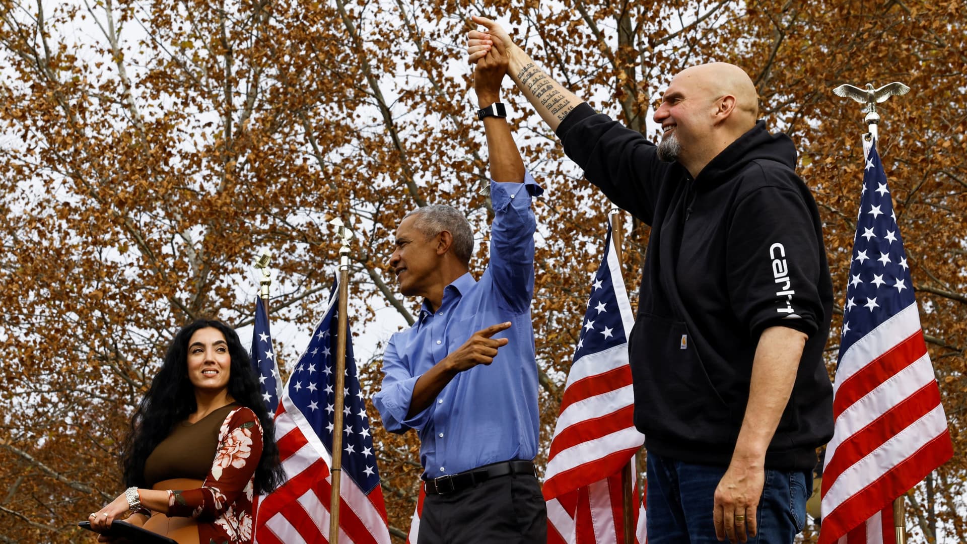 Former U.S. President Barack Obama campaigns on stage for John Fetterman, Pennsylvania Democratic nominee for the U.S. Senate, as Gisele Fetterman stands nearby, in Pittsburgh, Pennsylvania, U.S., November 5, 2022. 