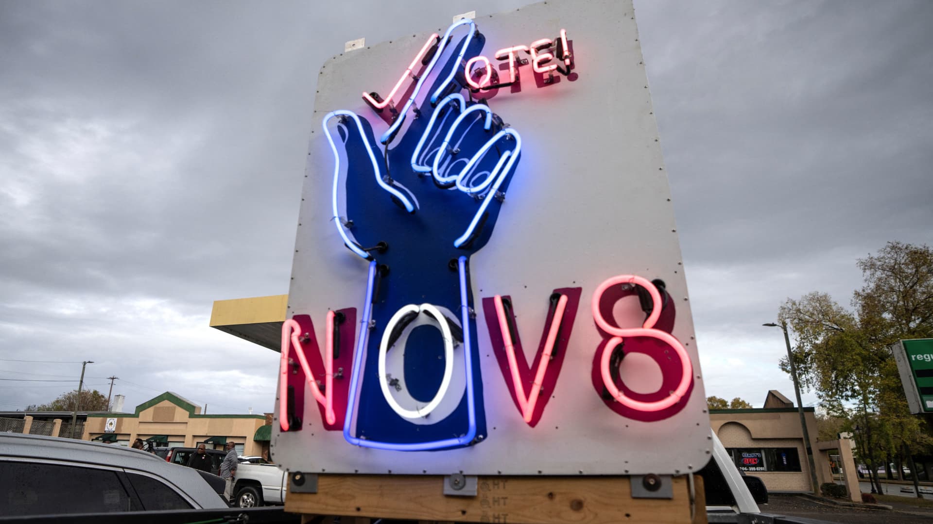A neon voting sign is displayed on a truck during a midterm campaign election stop by Senator Raphael Warnock in Augusta, Georgia, U.S., November 5, 2022. 