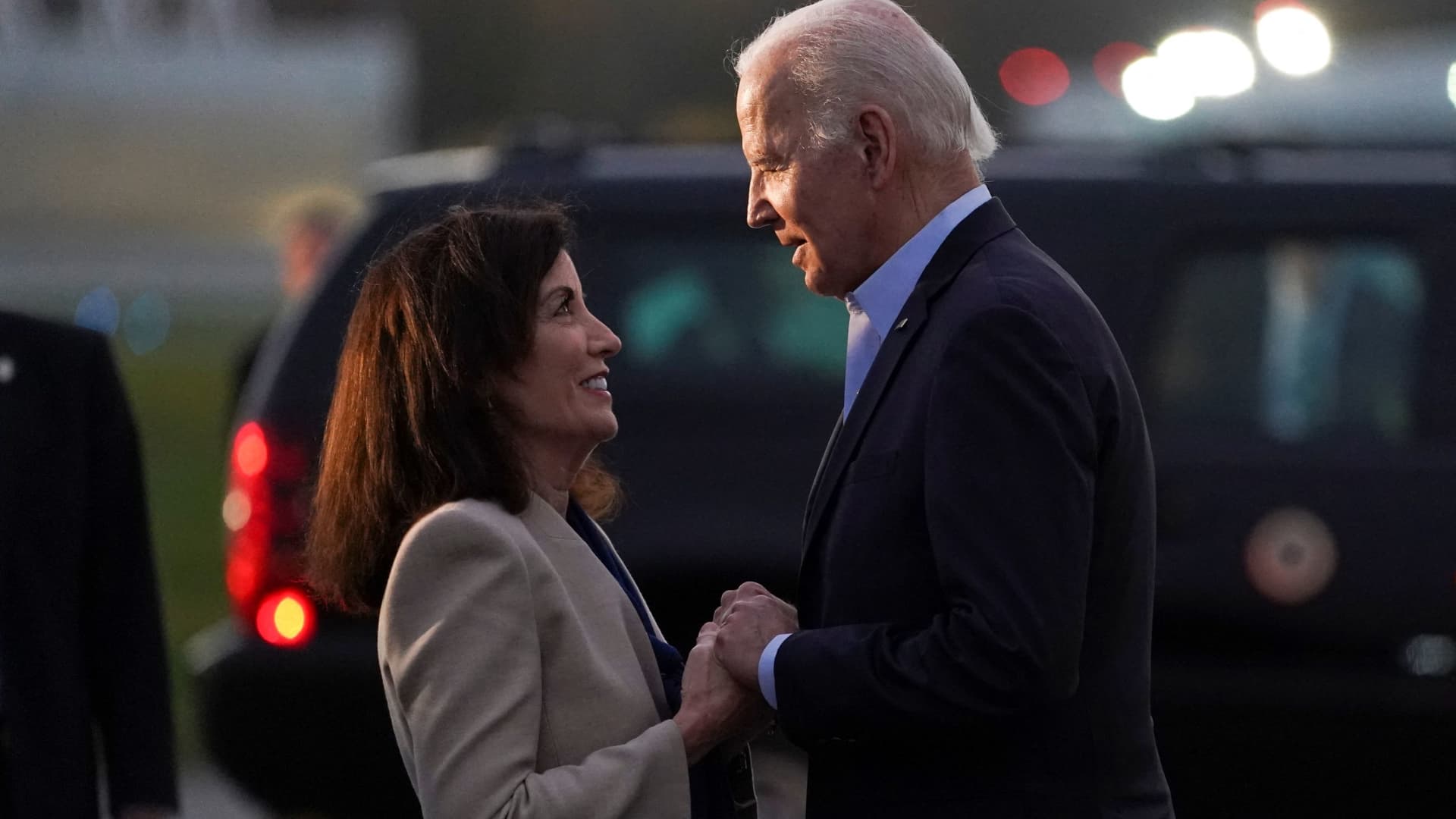 President Joe Biden is greeted by Democratic incumbent Governor Kathy Hochul as he arrives at Westchester County Airport, to speak at her campaign rally and other New York Democrats in Westchester County, U.S., November 6, 2022. 