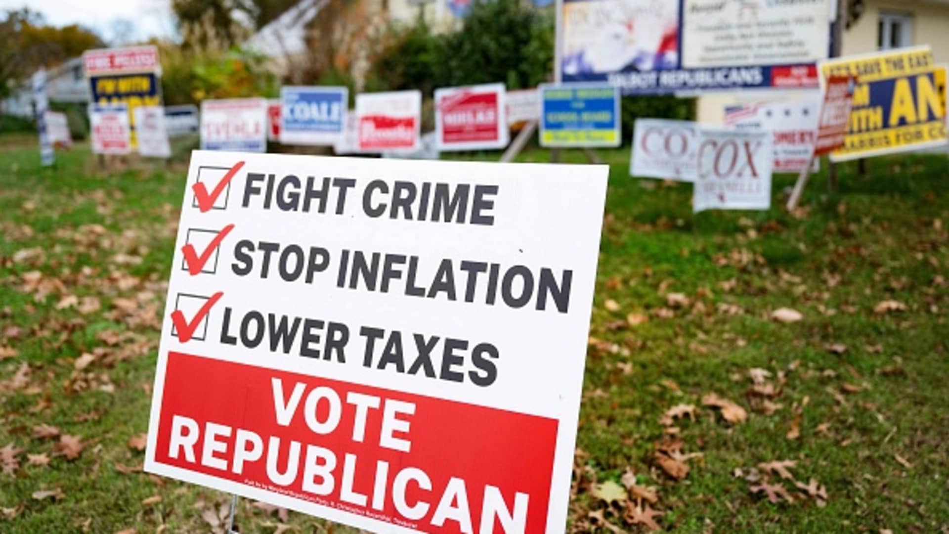 Election placards stand in the grass outside of the Talbot County Republican Central Committee in Easton, Maryland, on November 7, 2022.