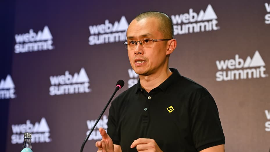 Binance CEO Changpeng Zhao speaking at a press conference during Web Summit 2022.