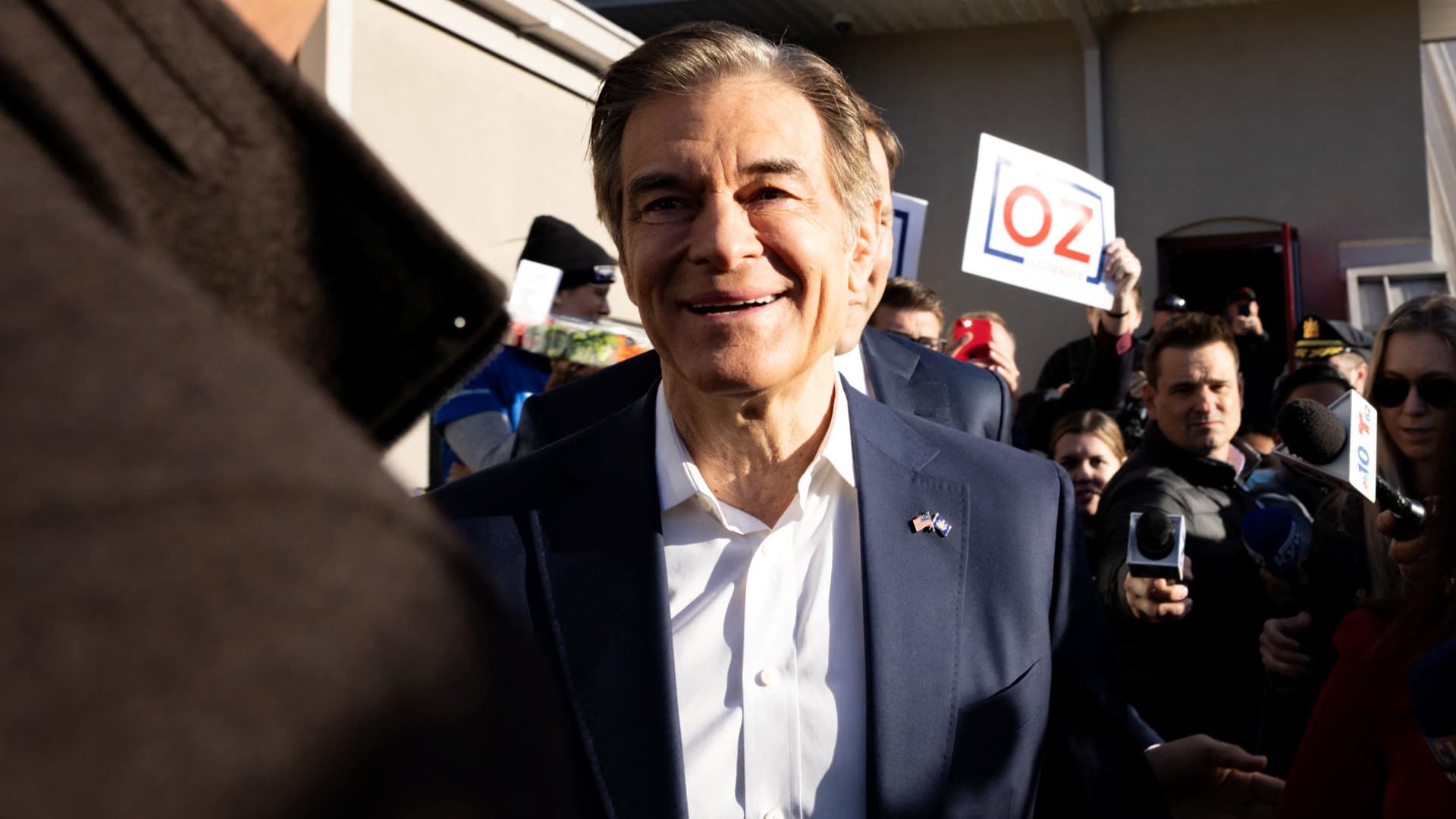 Republican Senate candidate Dr. Mehmet Oz departs from his polling location after voting in the 2022 U.S. midterm election in Bryn Athyn, Pennsylvania, U.S., November 8, 2022. 