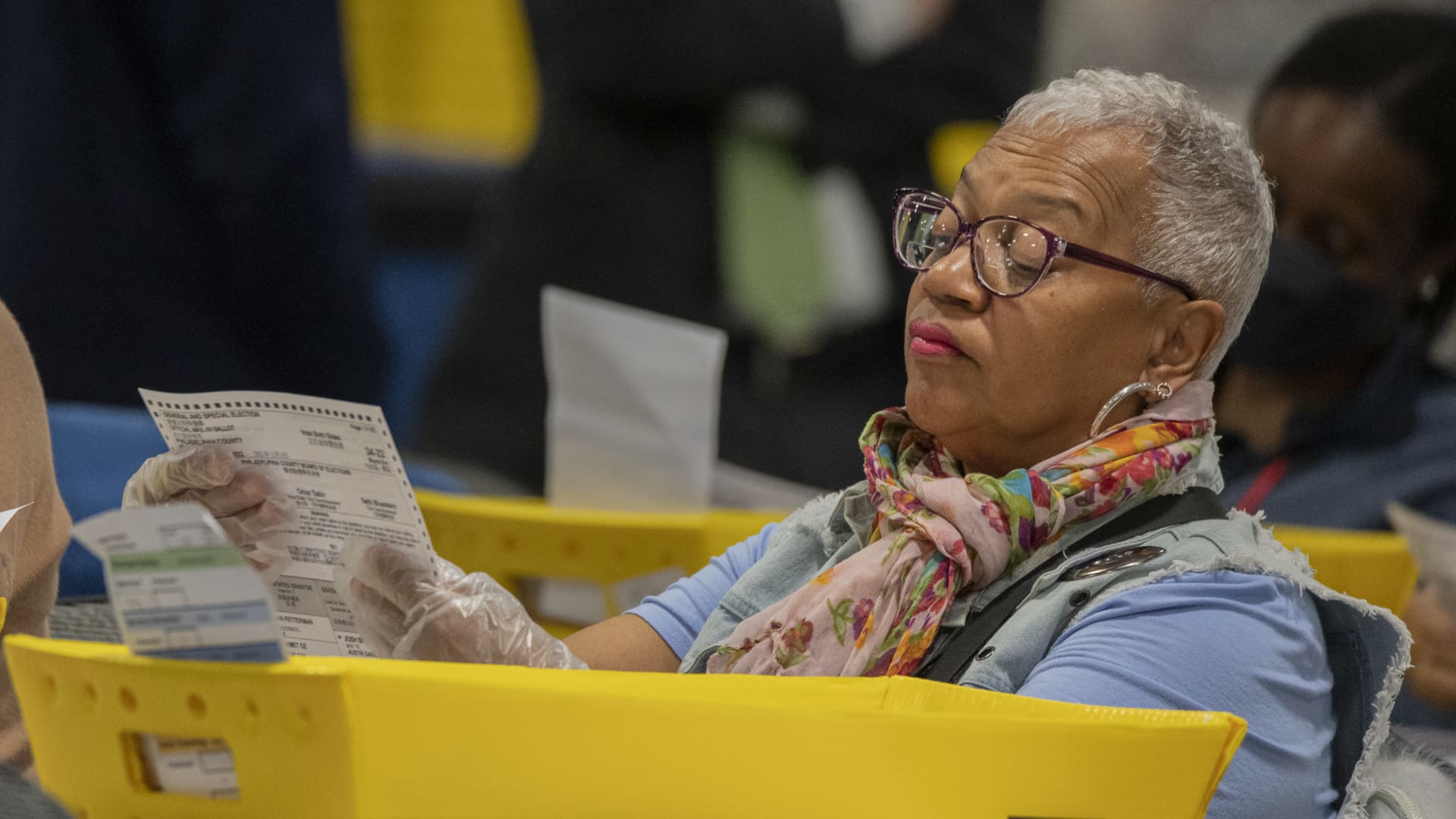 An election worker prepare ballots to be scanned at the Philadelphia Ballot Processing Center in Philadelphia, Pennsylvania, US, on Tuesday, Nov. 8, 2022.