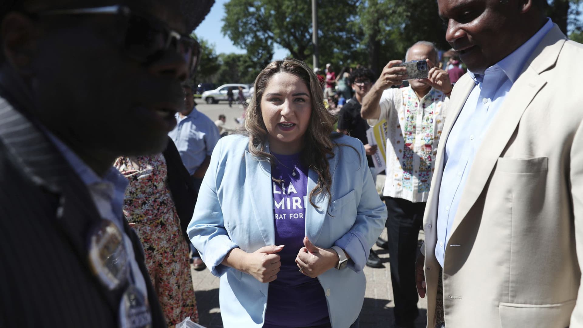 Delia Ramirez, candidate for the 3rd Congressional District, arrives at Humboldt Park on Saturday, June 18, 2022. Sen. Bernie Sanders spoke in support for Ramirez and Jonathan Jackson, right, candidate for the 1st Congressional District. (John J. Kim/Chicago Tribune/Tribune News Service via Getty Images)
