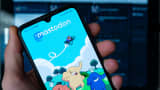 Mastodon homepage is seen displayed on a mobile phone screen held by hand. It has been reported that more than 200.000 new users flocked the social media app after the takeover of Twitter by Elon Musk.