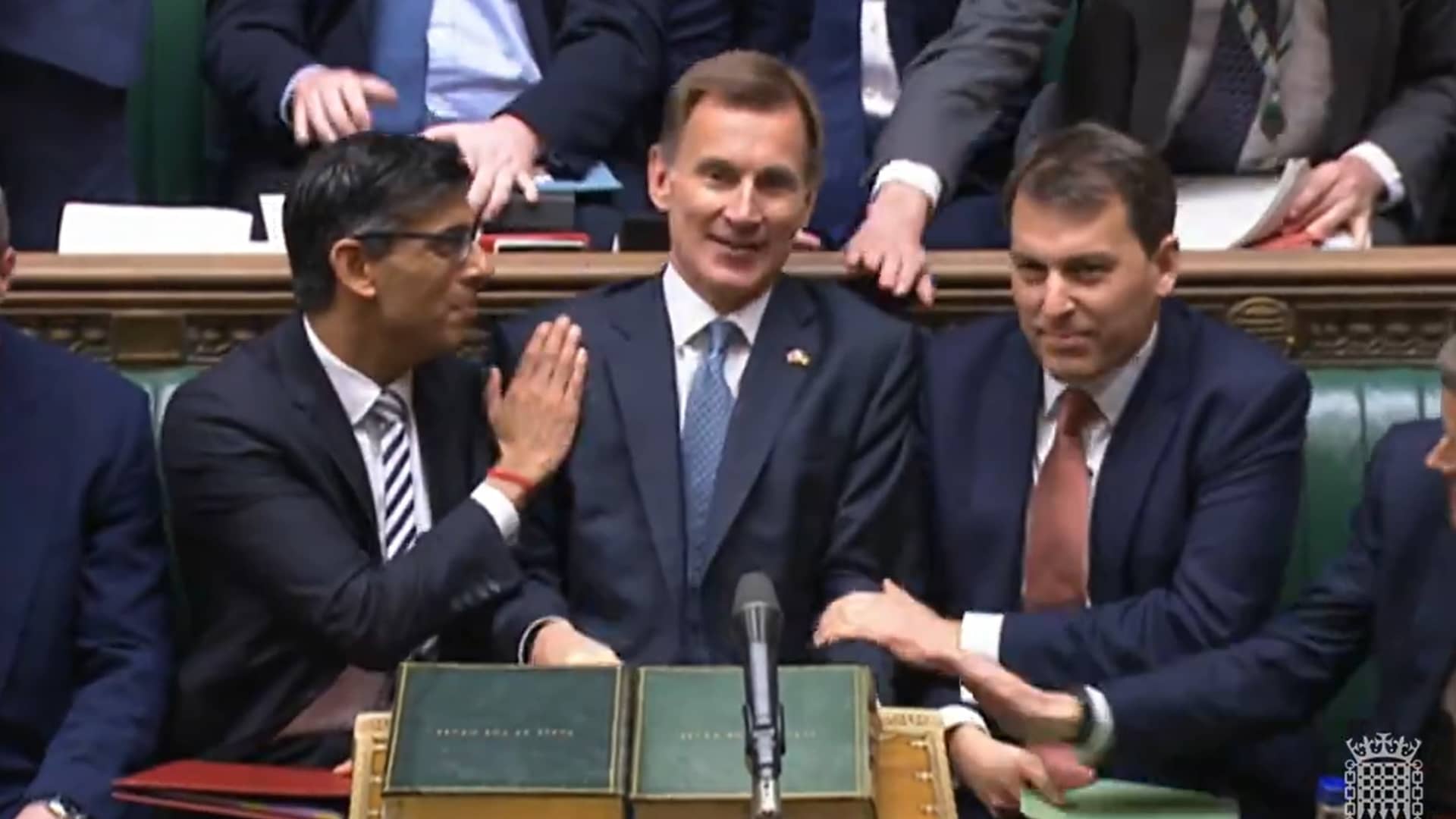 LONDON - Prime Minister Rishi Sunak congratulates Chancellor of the Exchequer Jeremy Hunt after he delivered his autumn statement to MPs in the House of Commons, announcing a host of tax rises and spending cuts in an effort to balance the country's finances.