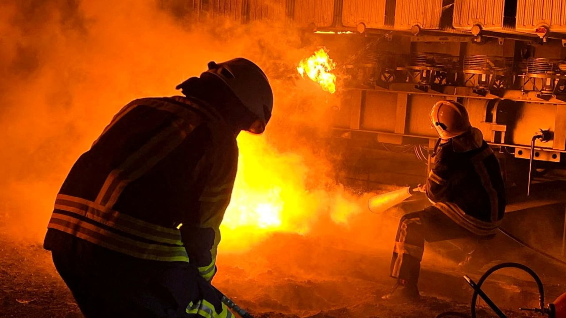 Firefighters work to put out a fire at energy infrastructure facilities, damaged by Russian missile strike, as Russia's attack on Ukraine continues, in Kyiv region, Ukraine November 15, 2022.