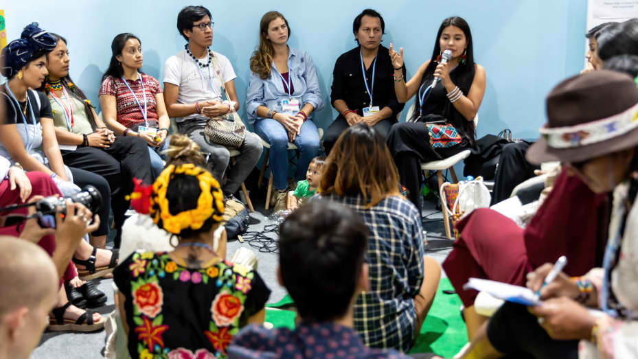 SHARM EL SHEIKH, SOUTH SINAI, EGYPT - 2022/11/16: Young participants meet on a discussion panel in Youth and Children Pavilion during the COP27 UN Climate Change Conference, held by UNFCCC in Sharm El-Sheikh International Convention Center. COP27, running from November 6 to November 18 in Sharm El Sheikh focuses on implementation of measures already agreed during previous COPs. The Conference in Sharm El Sheikh focuses also on the most vulnerable communities as the climate crisis hardens life conditions of