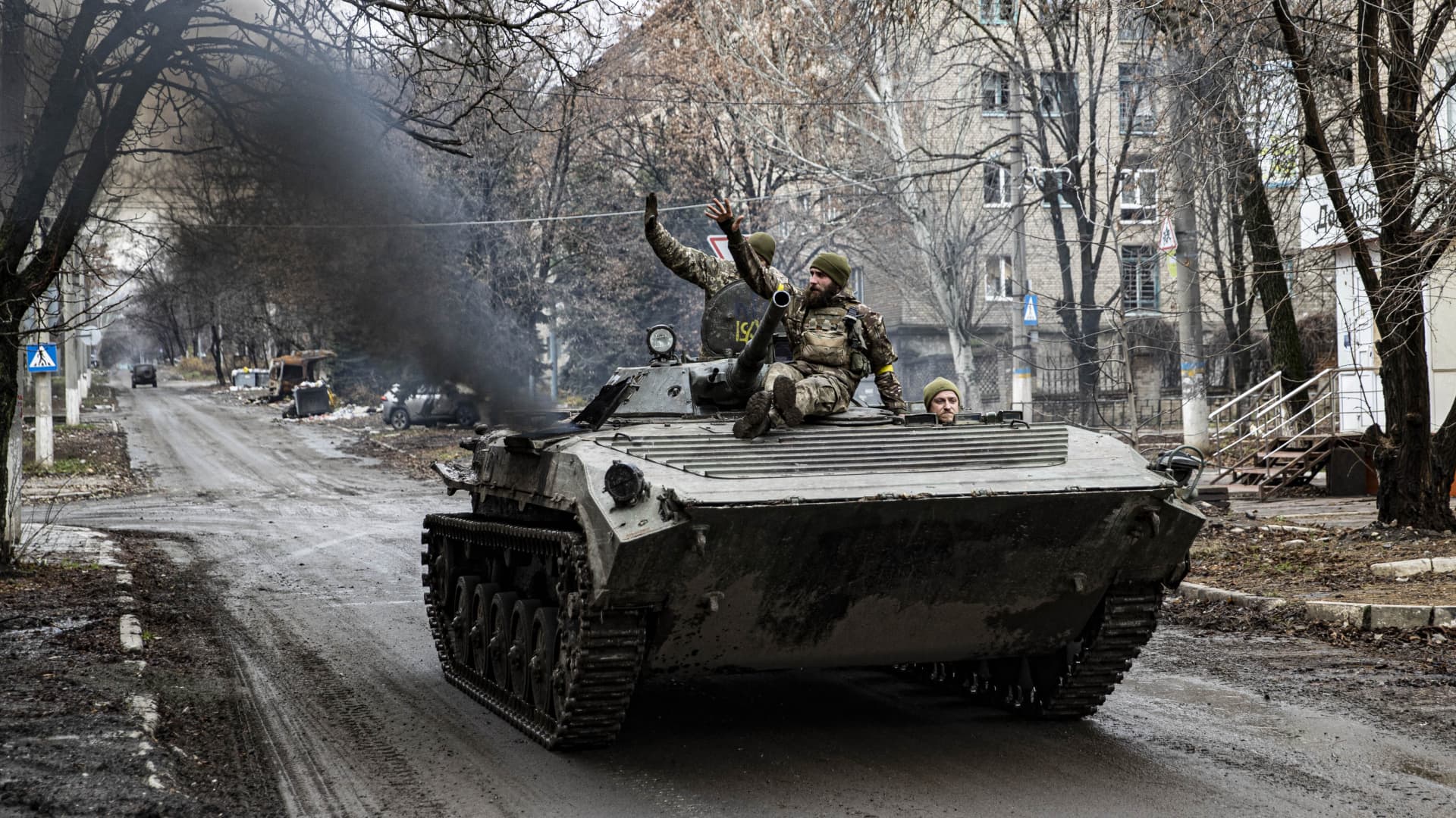 Ukrainian soldiers are seen in a tank as the U.K. defense ministry says Russian reservists have likely suffered heavy casualties.