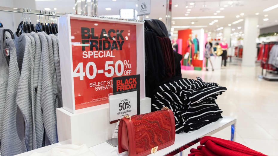 A Black Friday sale sign in the clothing department of the Macy's flagship store on Black Friday in New York, US, on Friday, Nov. 25, 2022.