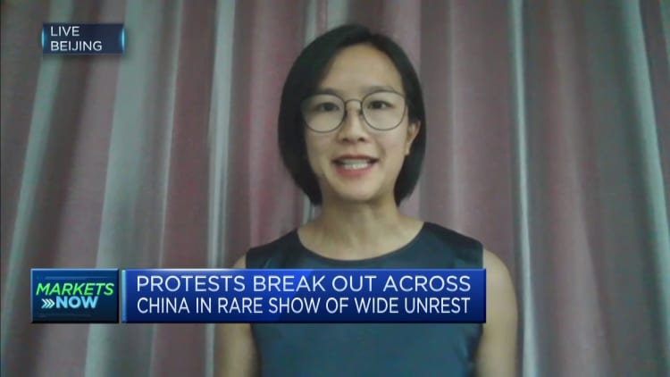 People in China grow impatient with Covid control measures as protests erupt