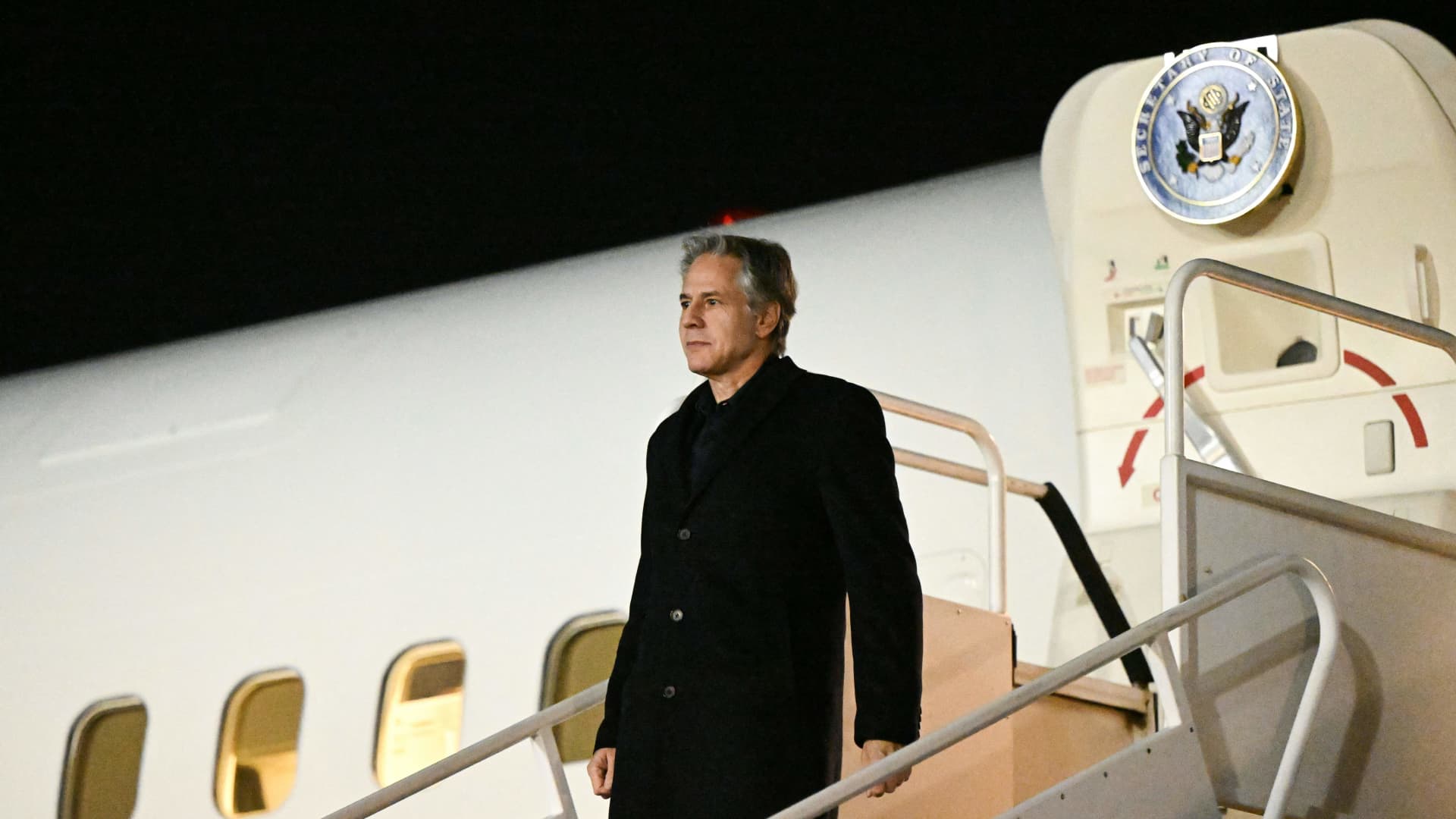 US Secretary of State Antony Blinken arrives at Henri Coanda airport, in Bucarest, on November 29, 2022, ahead of a NATO meeting.