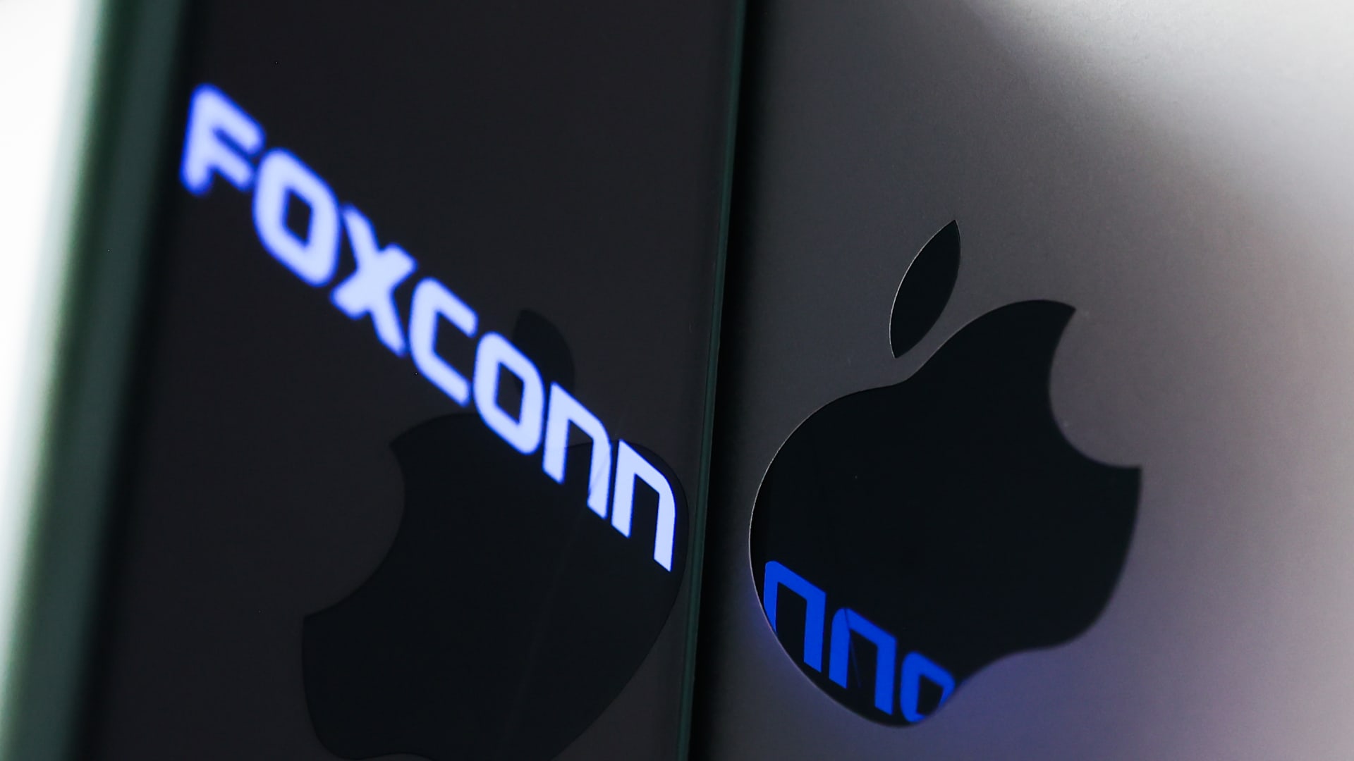 Iphone maker Foxconn experiences slump in revenue just after unrest and Covid outbreak at critical China plant