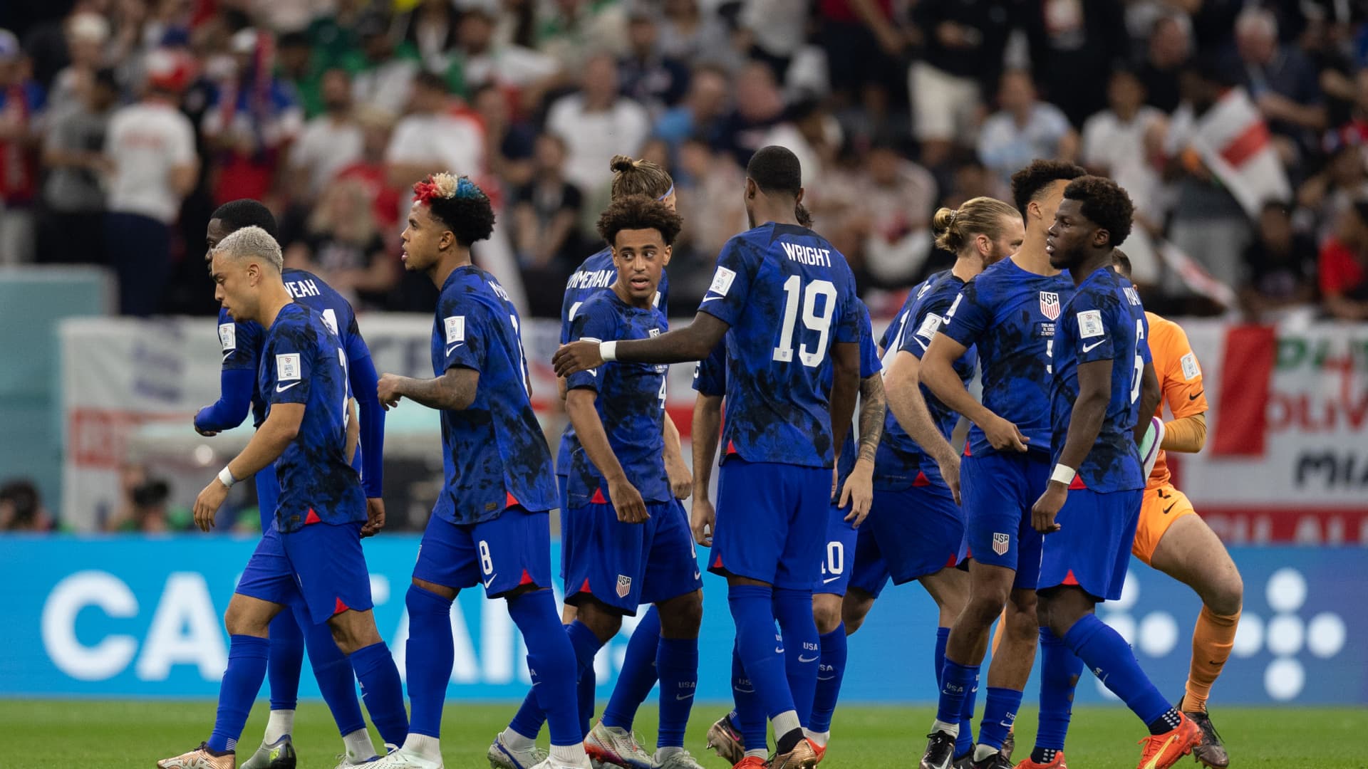USA leave a team huddle led by Tyler Adams of USA during the FIFA World Cup Qatar 2022 Group B match between England and USA at Al Bayt Stadium on November 25, 2022 in Al Khor, Qatar.